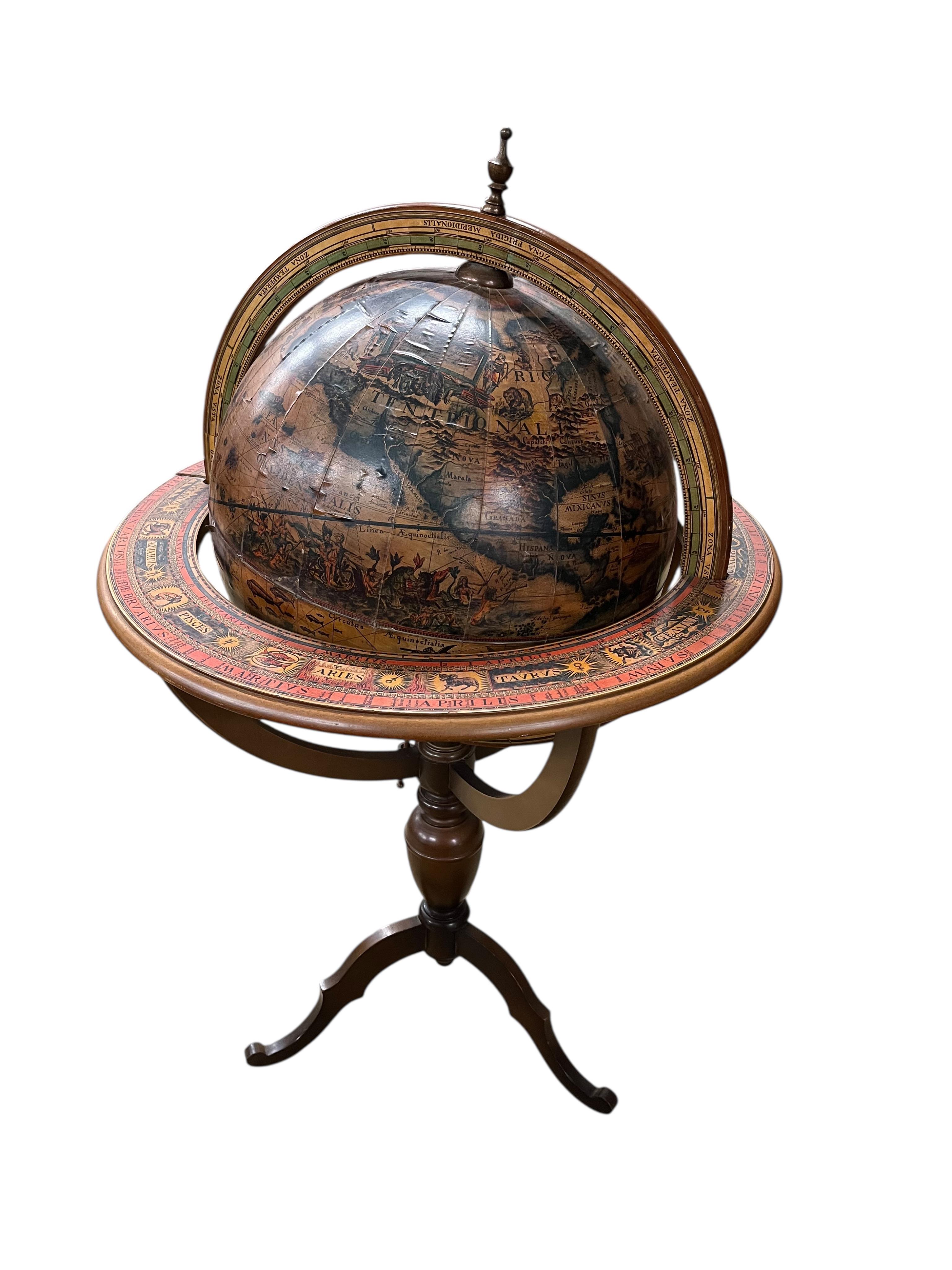 A reproduction terrestrial globe on beech tripod, height 118cm